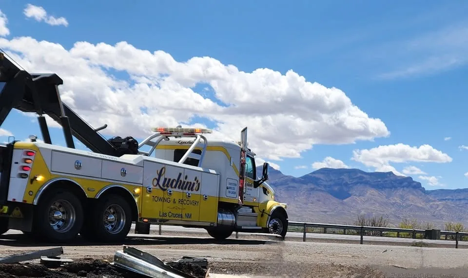 Luchini's yellow heavy-duty tow truck